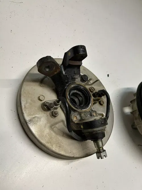 2002 02 Honda TRX500 FA2 4x4 Foreman Rubicon GOOD Left Hub Spindle Brake Plate