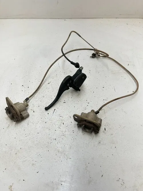 06 2006 Polaris Trail Boss 330 2x4 OEM GOOD! Front Brakes Caliper Line Master Cy