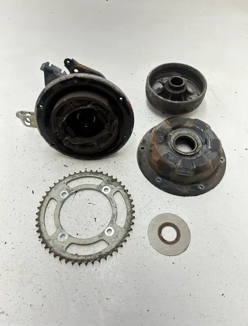 01 2001 Honda Fourtrax TRX90 Trx 90 OEM GOOD Rear Axle Carrier Brake Drum Sprock