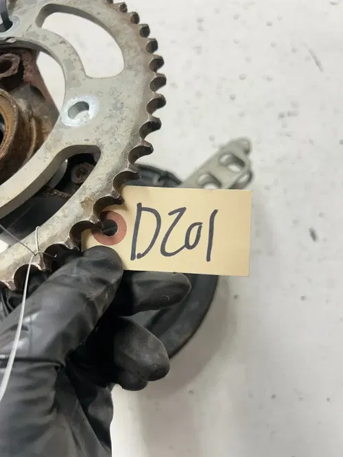 01 2001 Honda Fourtrax TRX90 Trx 90 OEM GOOD Rear Axle Carrier Brake Drum Sprock