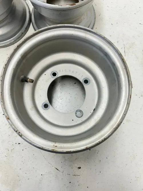02 2002 Polaris Scrambler 90 2 Stroke OEM LOT Wheel Rim Set Front 7x5 Rear 8x5.5