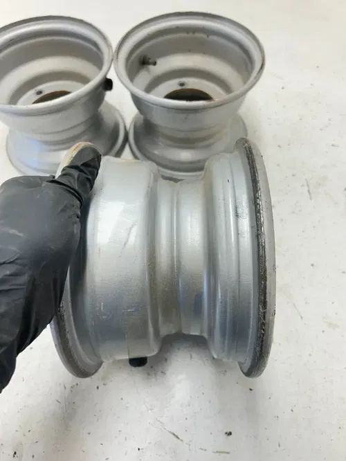 02 2002 Polaris Scrambler 90 2 Stroke OEM LOT Wheel Rim Set Front 7x5 Rear 8x5.5