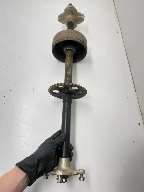 03 2003 Polaris Sportsman 90 2 Stroke 2x4 OEM Rear End Axle Hub Carrier Brake