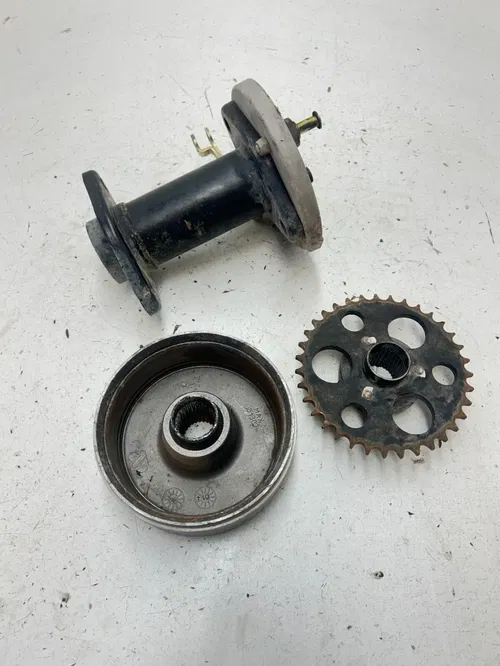 02 2002 Polaris Scrambler 90 2 Stroke OEM Rear Axle Carrier Brake Drum Spro READ