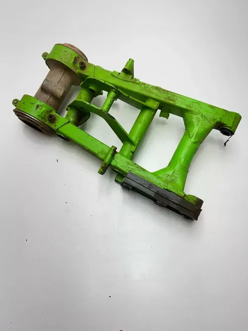 2000 Kawasaki Mojave 250 KSF250 OEM Swing Arm Axle Carrier Brake Mount Free Ship
