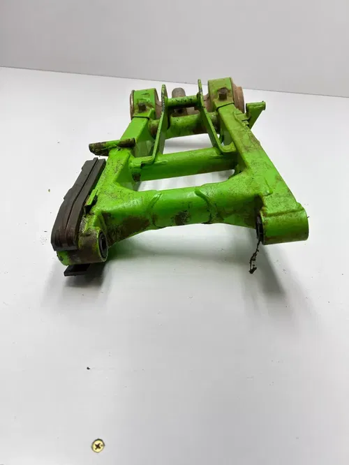 2000 Kawasaki Mojave 250 KSF250 OEM Swing Arm Axle Carrier Brake Mount Free Ship