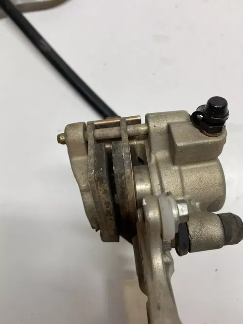 2005 05 Kawasaki KX250F WORKING COMPLETE BACK BRAKE CALIPER MASTER LINE LEVER