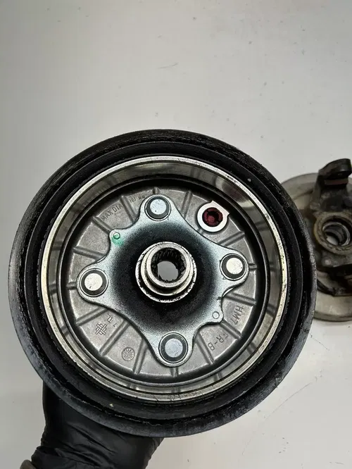 2002 02 Honda TRX500 FA2 4x4 Foreman Rubicon GOOD Right Hub Spindle Brake Plate