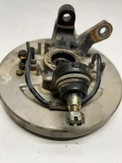 2002 02 Honda TRX500 FA2 4x4 Foreman Rubicon GOOD Right Hub Spindle Brake Plate