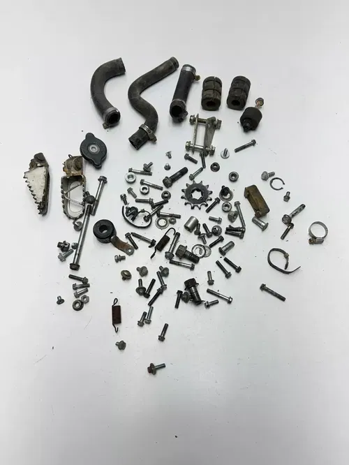 1995 95 Kawasaki KX100 kx 100 OEM LOT  Bolt Hardware Foot Peg Tube Mount Nut Cap
