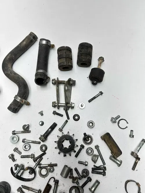 1995 95 Kawasaki KX100 kx 100 OEM LOT  Bolt Hardware Foot Peg Tube Mount Nut Cap
