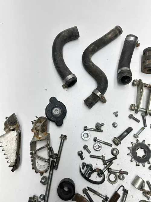 1995 95 Kawasaki KX100 kx 100 OEM LOT  Bolt Hardware Foot Peg Tube Mount Nut Cap