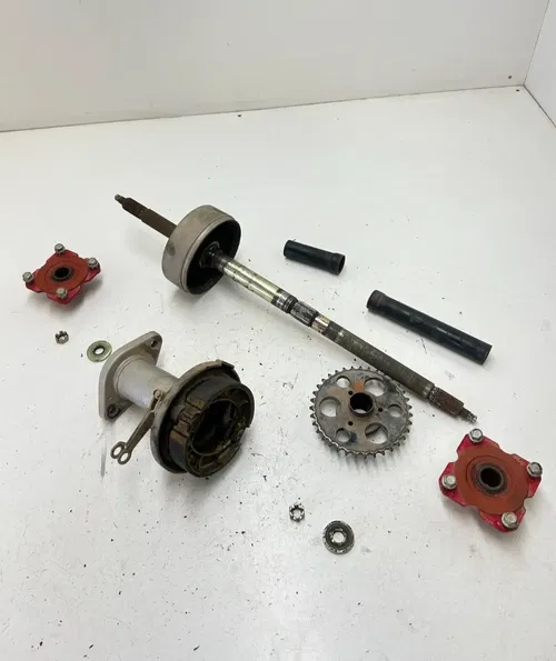 05 2005 Polaris Predator 90 2 Stroke OEM GOOD Axle Carrier Brake Hubs Sprocket