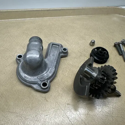 2024 KTM 250SXF Balancer Shaft Water Pump Cover MC EX FC SXF XCF 2023-2025