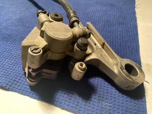 1999 Rm250 OEM Rear Brake Assembly Rear Caliper Master Guard 1999 OEM RM