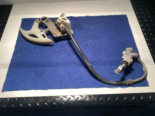 2011 CRF450R Rear Brake Assembly OEM Caliper Master Cylinder Brakes Honda CRF