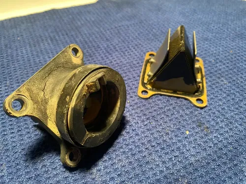 2002 KAWASAKI KX85 OEM INTAKE REED BLOCK ASSEMBLY CARBURATOR HOLDER