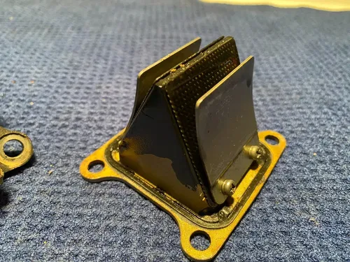 2002 KAWASAKI KX85 OEM INTAKE REED BLOCK ASSEMBLY CARBURATOR HOLDER