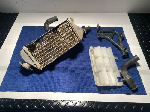 2002 KX85 OEM KAWASKAI RADIATORS MOUNTS GUARDS ASSEMBLY OEM KAWASAKI KX85