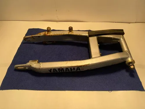 2003 YAMAHA TTR125 TTR125E SMALL WHEEL OEM SWINGARM SWING ARM SUSPENSION ARM OEM