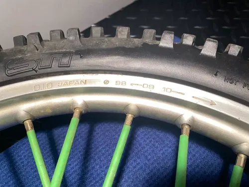 KAWASAKI KX80 OEM FRONT WHEEL TIRE ASSEMBLY KX80 FRONT WHEEL OEM 1995