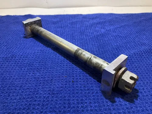 1999 SUZUKI RM 250 REAR AXLE AXLE BLOCKS ASSEMBLY OEM RM 250 SUZUKI RM AXLE