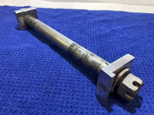 1999 SUZUKI RM 250 REAR AXLE AXLE BLOCKS ASSEMBLY OEM RM 250 SUZUKI RM AXLE