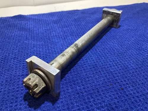 1999 SUZUKI RM 250 REAR AXLE AXLE BLOCKS ASSEMBLY OEM RM 250 SUZUKI RM AXLE