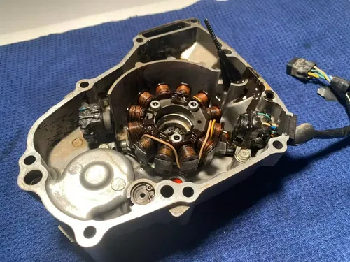 2011 HONDA CRF450R OEM STATOR AND LEFT MOTOR CASE COVER ASSEMBLY OEM CRF450R OEM