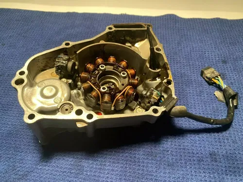 2011 HONDA CRF450R OEM STATOR AND LEFT MOTOR CASE COVER ASSEMBLY OEM CRF450R OEM
