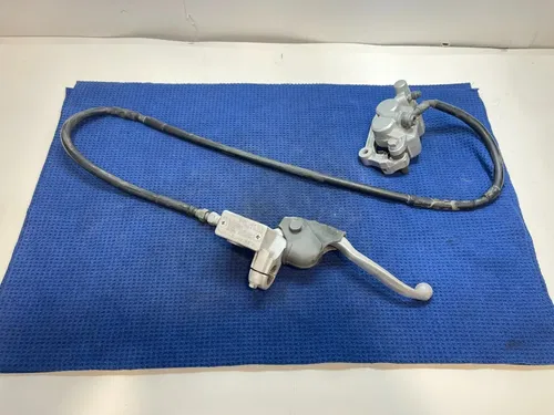2003 YAMAHA TTR125L OEM FRONT DISC BRAKE ASSEMBLY LINE CALIPER BRAKE LEVER