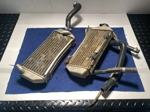 1999-2000 Suzuki RM 250 Radiators Left Right AND HOSE ASSEMBLY OEM SUZUKI