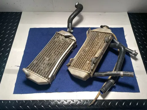 1999-2000 Suzuki RM 250 Radiators Left Right AND HOSE ASSEMBLY OEM SUZUKI