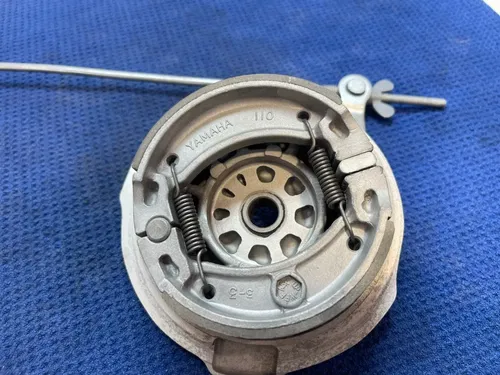2003 YAMAHA TTR125L OEM REAR BRAKE ASSEMBLY BRAKE BACKING PLATE DRUM BRAKE TTR