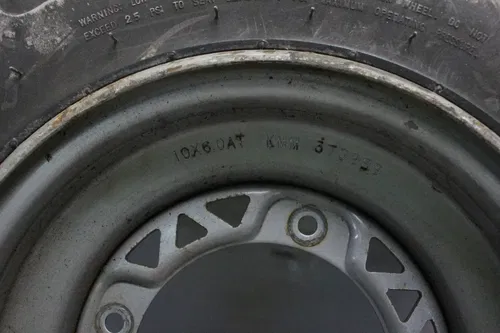 2004 Polaris Scrambler 500 4x4 Oem Front Wheel Rim And Brand New Tire S1948