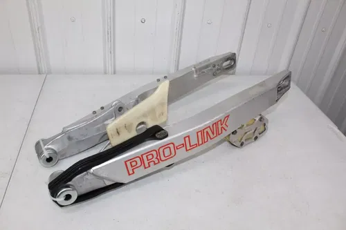 1988 Honda CR125 OEM Swingarm Swing Arm NEW chain slider CR 125 88/4