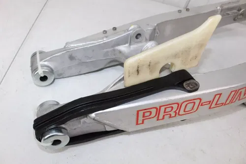 1988 Honda CR125 OEM Swingarm Swing Arm NEW chain slider CR 125 88/4