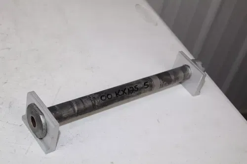1993 - 2002 Kawasaki KX125 Rear Axle 41068-1343 with nut and blocks KX 125 250