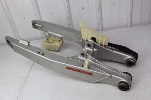 1988 Honda CR125 OEM Swingarm Swing Arm NEW chain slider CR 125 88/2