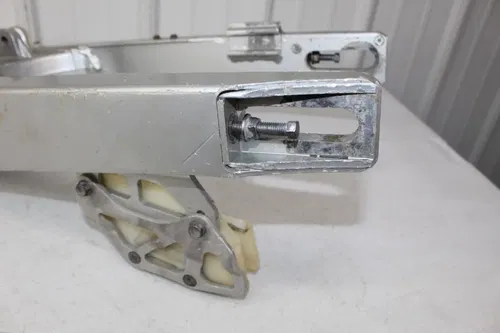 1988 Honda CR125 OEM Swingarm Swing Arm NEW chain slider CR 125 88/2