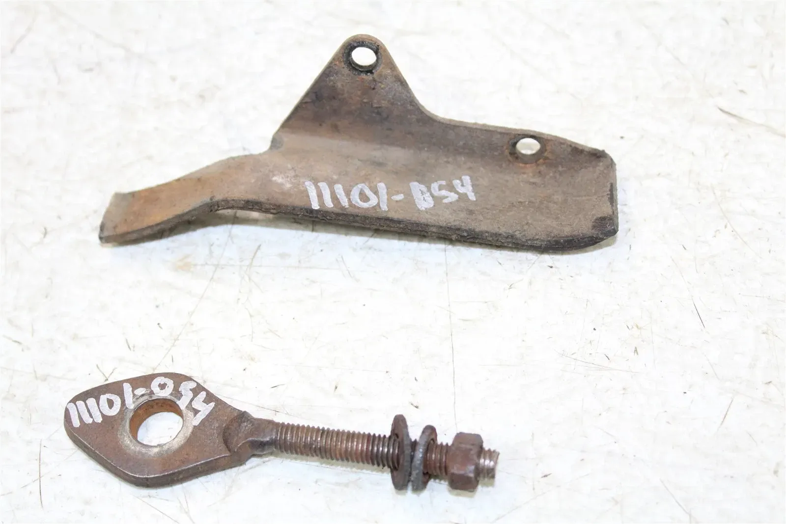 1985 Honda Fourtrax TRX 125 Chain Guide Guard w/ Axle Adjuster Bolt