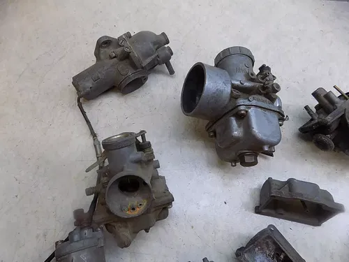 Lot of 8 Kawasaki Mikuni Carburetors / Parts from the 1970's