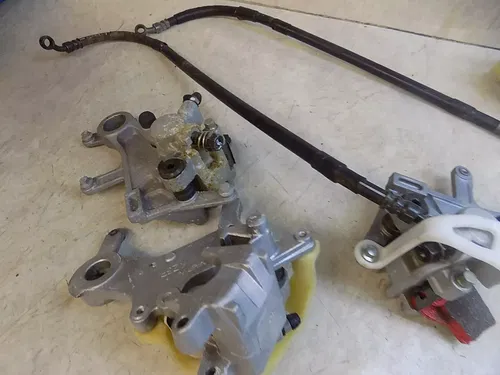 Honda Yamaha Kawasaki Suzuki Rear Brake Caliper / mounts lines yz kx cr 250 125