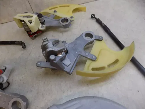 Honda Yamaha Kawasaki Suzuki Rear Brake Caliper / mounts lines yz kx cr 250 125