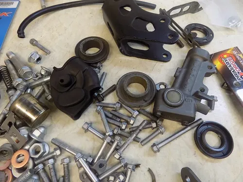 Kawasaki KX250 Nuts bolts parts pieces misc guide pads    KX 250  2005