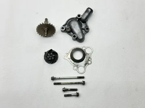 1999 Honda CR125R Water Pump Impeller Engine Housing Cover Shaft 19221-KZ4-B00