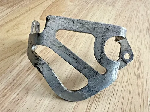 1990 Honda CR250R OEM Rear Brake Caliper Guard Protector - Needs Repair