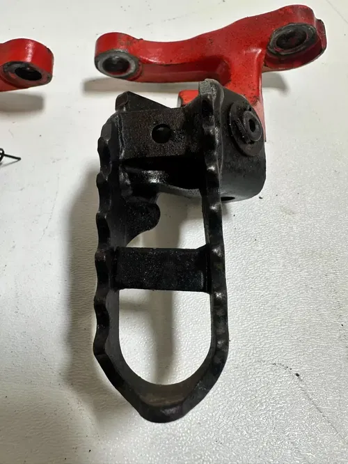 1984 Honda XR250R  Foot Pegs & Mounts W/Bolts OEM Stock Nice!