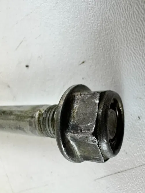 2006 HONDA CR85R Front Axle Bolt and Nut OEM Stock 03-07