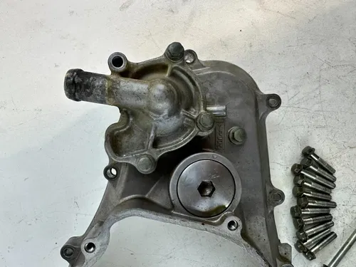 2008 Honda CRF 250R Stock  Inner Clutch Cover w/ water pump & Bolts OEM